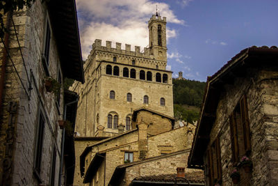 Low angle view of old building against sky