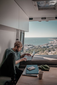 Man sitting on table