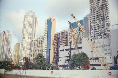 Low angle view of skyscrapers against sky