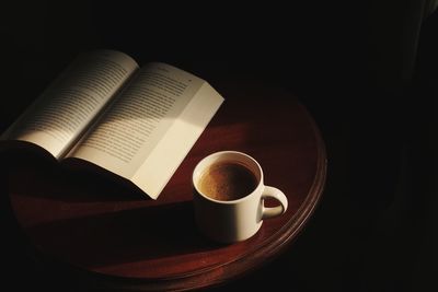 High angle view of coffee cup on table