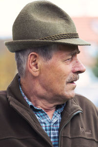 Portrait of man wearing hat