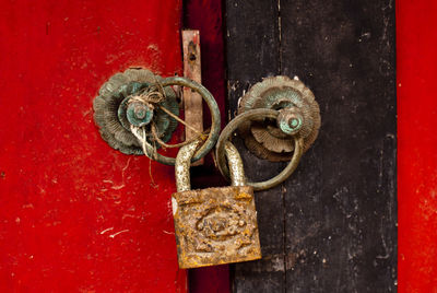 Close-up of lock on door knockers