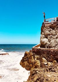 Scenic view of sea against clear sky