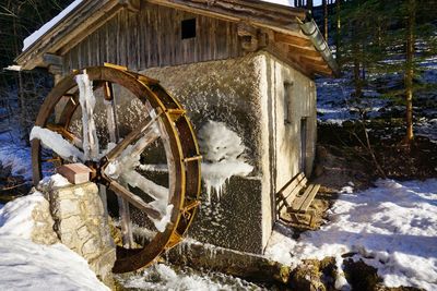 Built structure on snow covered land during winter