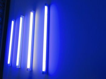 Illuminated fluorescent lights on wall