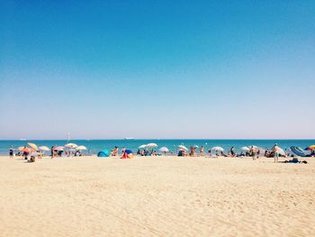 Scenic view of beach against clear sky