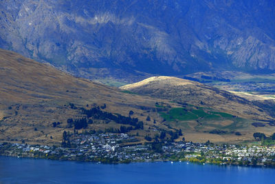 Aerial view of lake and buildings in city