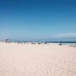 Scenic view of sea against blue sky