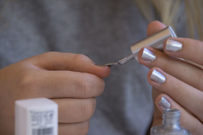 Cropped image of people holding hands