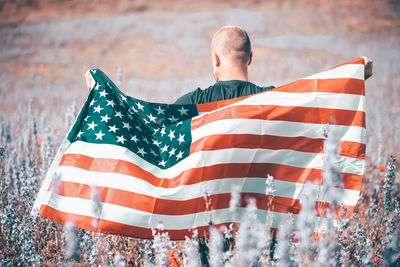 Low angle view of men flag