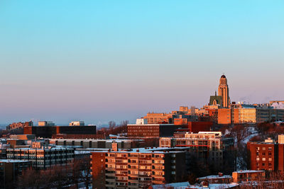 Cityscape against clear sky