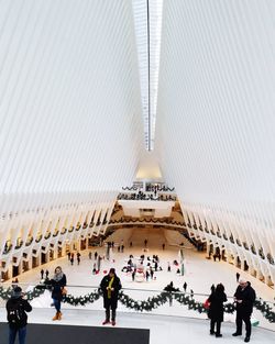 People walking in front of museum