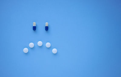 High angle view of blue drinking water on table