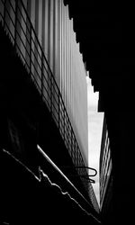 Low angle view of buildings against sky- monochrome 