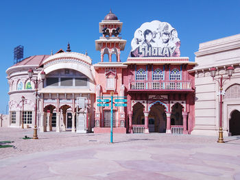 Facade of historical building against clear blue sky