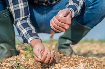 Midsection of man gardening