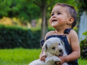 Portrait of cute girl with dog