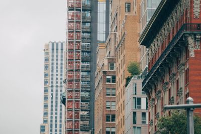 Low angle view of residential buildings against sky