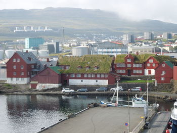 High angle view of townscape by river