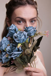 Close-up of woman with bouquet