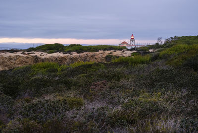 Scenic view of land against sky