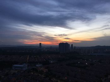 Aerial view of city at dusk