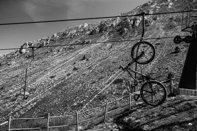 Low angle view of bicycle against sky