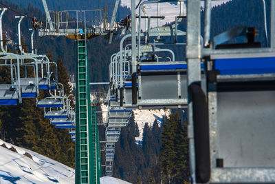 Chairlift in the woods of the asiago plateau, vicenza, italy