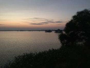 Scenic view of sea against sky at sunset
