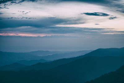 Scenic view of mountains against sky during sunset