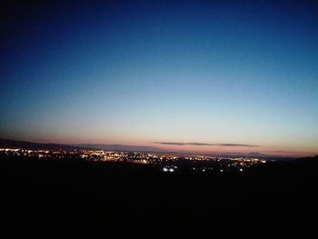 View of illuminated cityscape at night