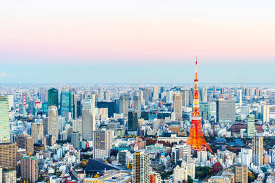 Aerial view of city buildings against sky