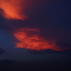 Low angle view of cloudy sky at sunset