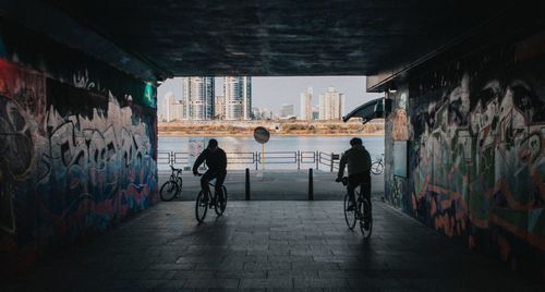 People on bicycle in city