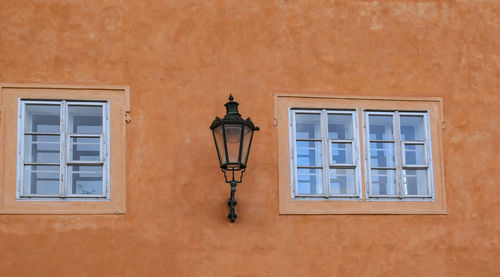 Street light against building