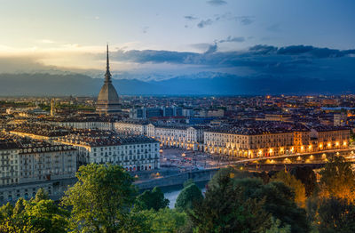 From day, till night. the most famous monument of turin in three different hour. piedmont, italy.