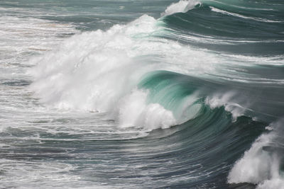 Stormy sea with breaking waves