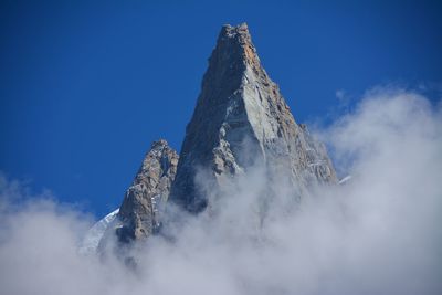 Low angle view of building against blue sky