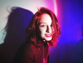 Close-up of young woman with eyes closed