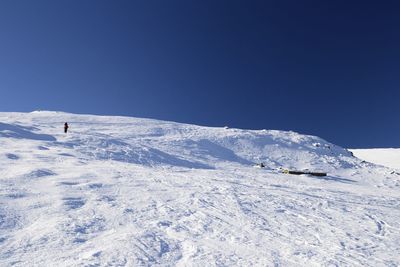 Scenic view of snowcapped mountain against sky