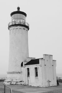 Low angle view of lighthouse against clear sky