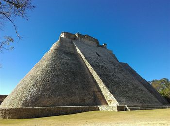 Low angle view of fort against clear sky