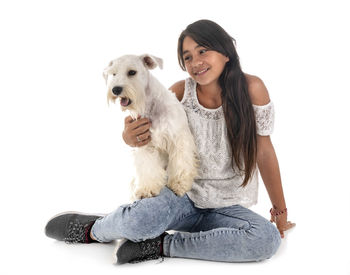 Portrait of a young woman with dog