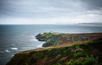 View of a lighthouse landscape in howth, ireland.