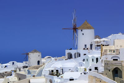 Windmill in oia, santorini island, greece