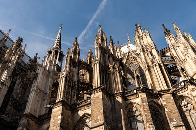 Low angle view of cologne cathedral against sky