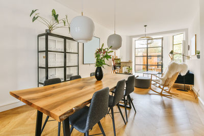 Empty chairs and tables in restaurant