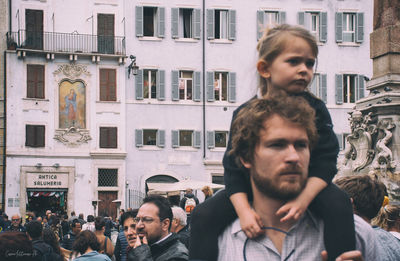 Friends standing in city