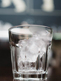 Close-up of water in glass on table