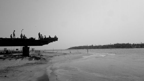 Scenic view of beach against clear sky